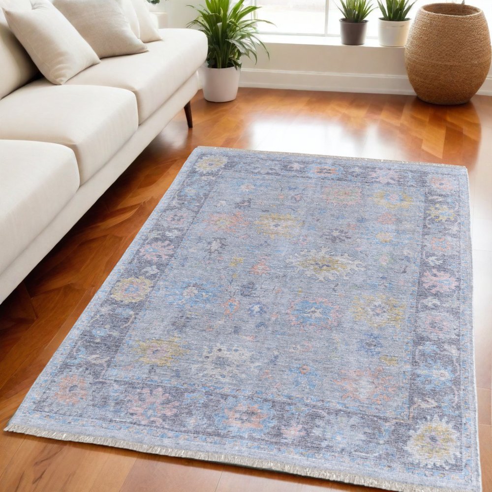 4' X 6' Orange Blue and Gold Floral Hand Woven Distressed Area Rug With Fringe