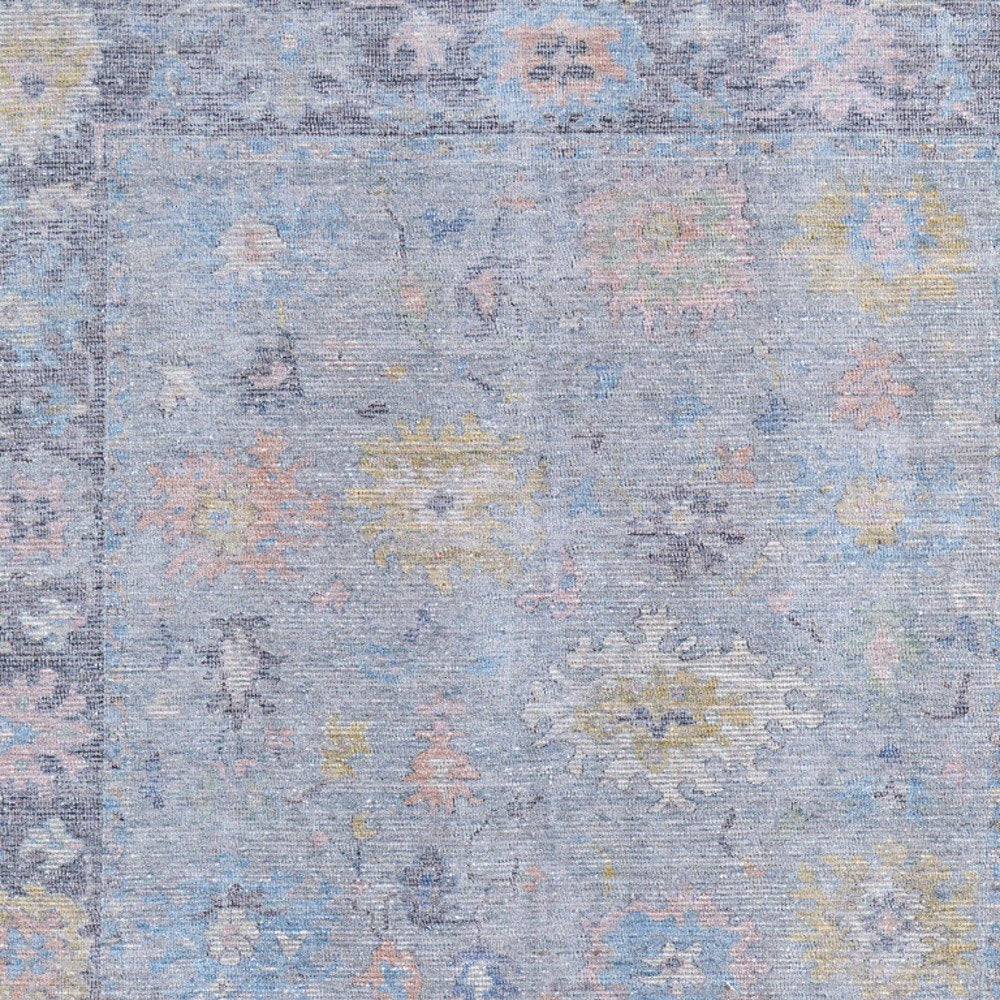 4' X 6' Orange Blue and Gold Floral Hand Woven Distressed Area Rug With Fringe