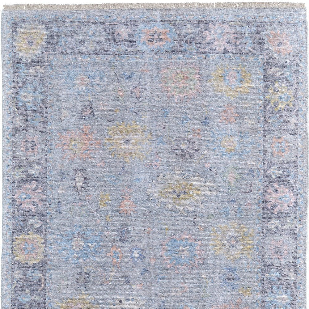 4' X 6' Orange Blue and Gold Floral Hand Woven Distressed Area Rug With Fringe