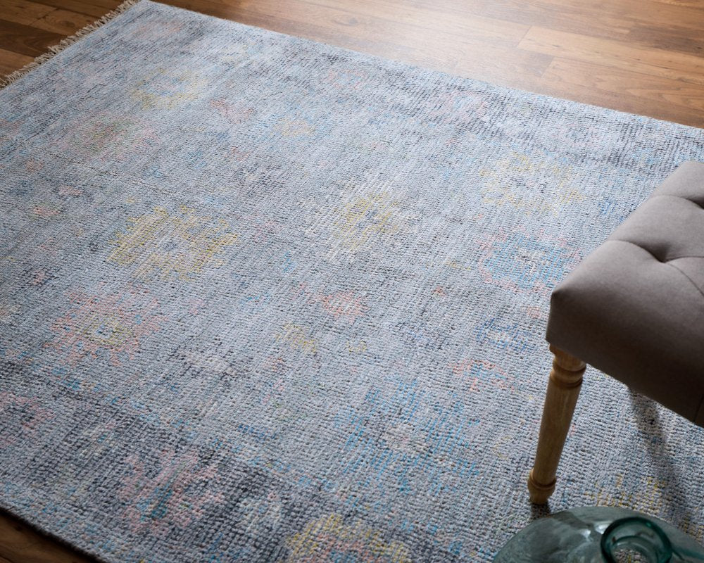 4' X 6' Orange Blue and Gold Floral Hand Woven Distressed Area Rug With Fringe