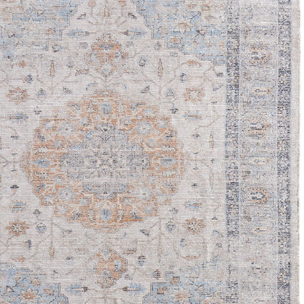 4' X 6' Ivory Blue and Orange Oriental Hand Woven Distressed Area Rug With Fringe