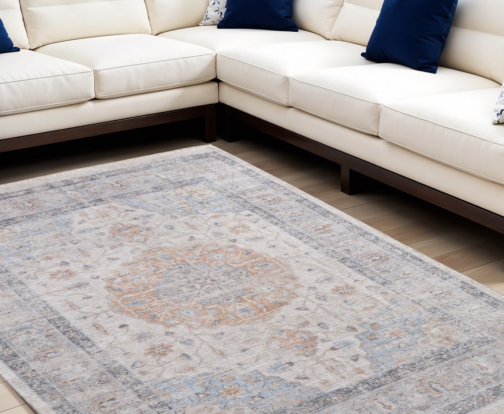 4' X 6' Ivory Blue and Orange Oriental Hand Woven Distressed Area Rug With Fringe