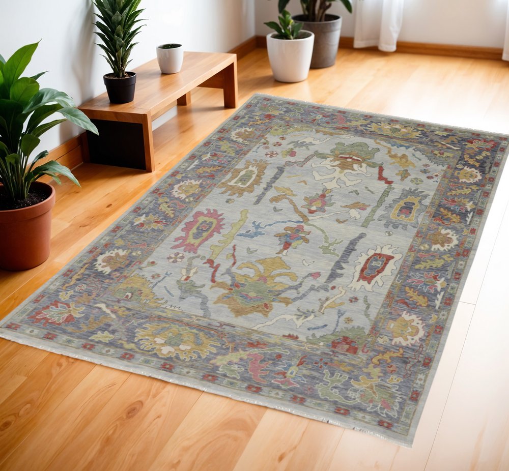 6' X 9' Gray Blue and Gold Wool Oriental Hand Knotted Area Rug With Fringe