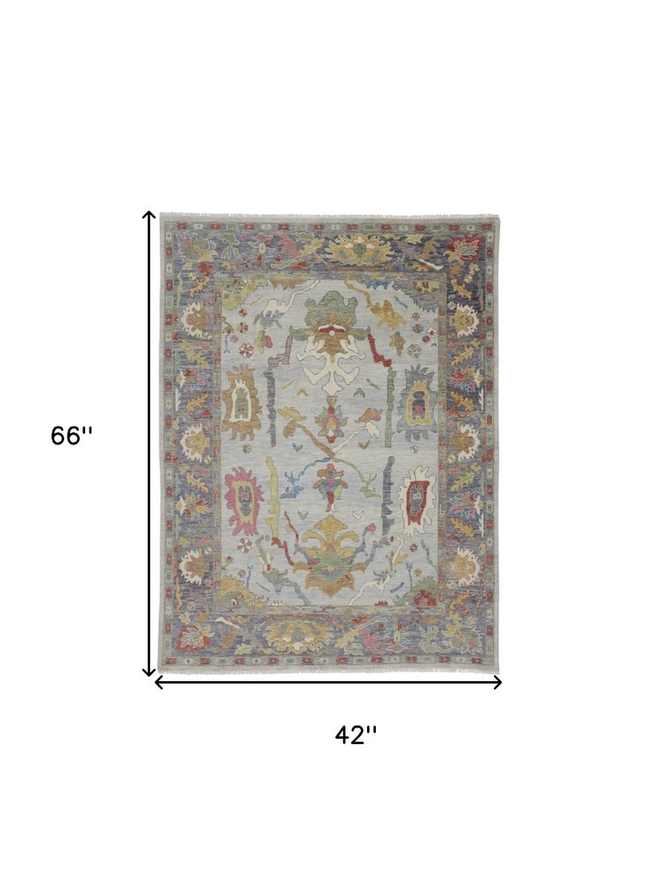 6' X 9' Gray Blue and Gold Wool Oriental Hand Knotted Area Rug With Fringe