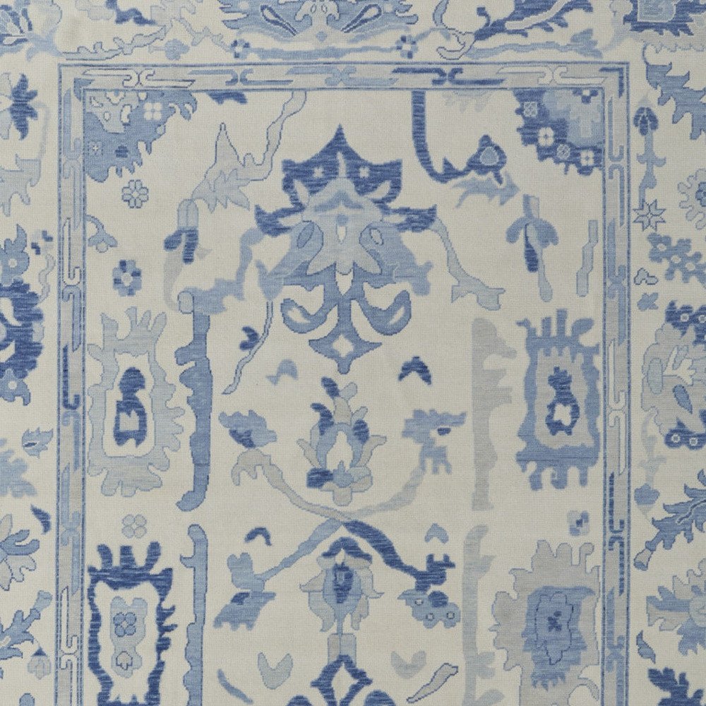 4' X 6' Ivory and Blue Wool Floral Hand Knotted Area Rug With Fringe