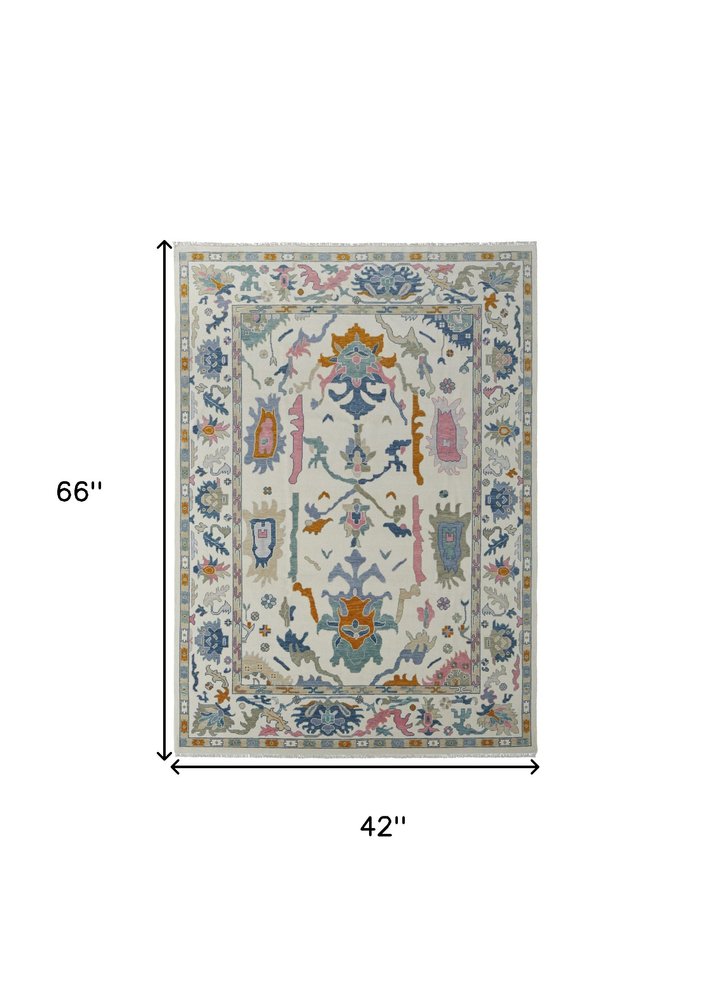 9' X 13' Blue Ivory and Pink Wool Floral Hand Knotted Area Rug With Fringe