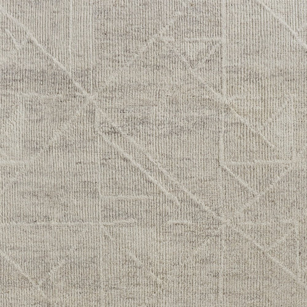 4' X 6' Tan and Ivory Wool Hand Knotted Area Rug