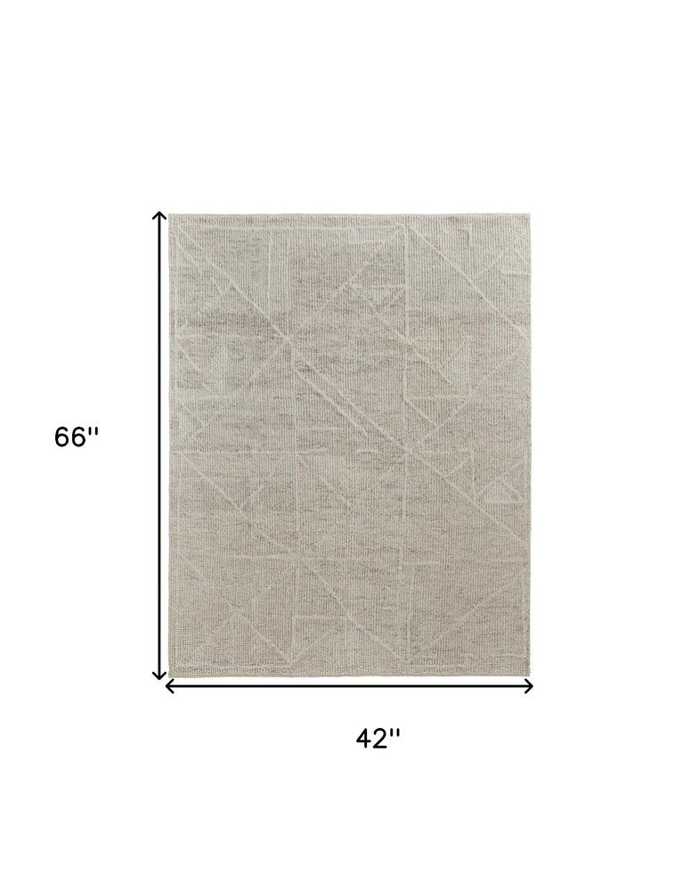 4' X 6' Tan and Ivory Wool Hand Knotted Area Rug