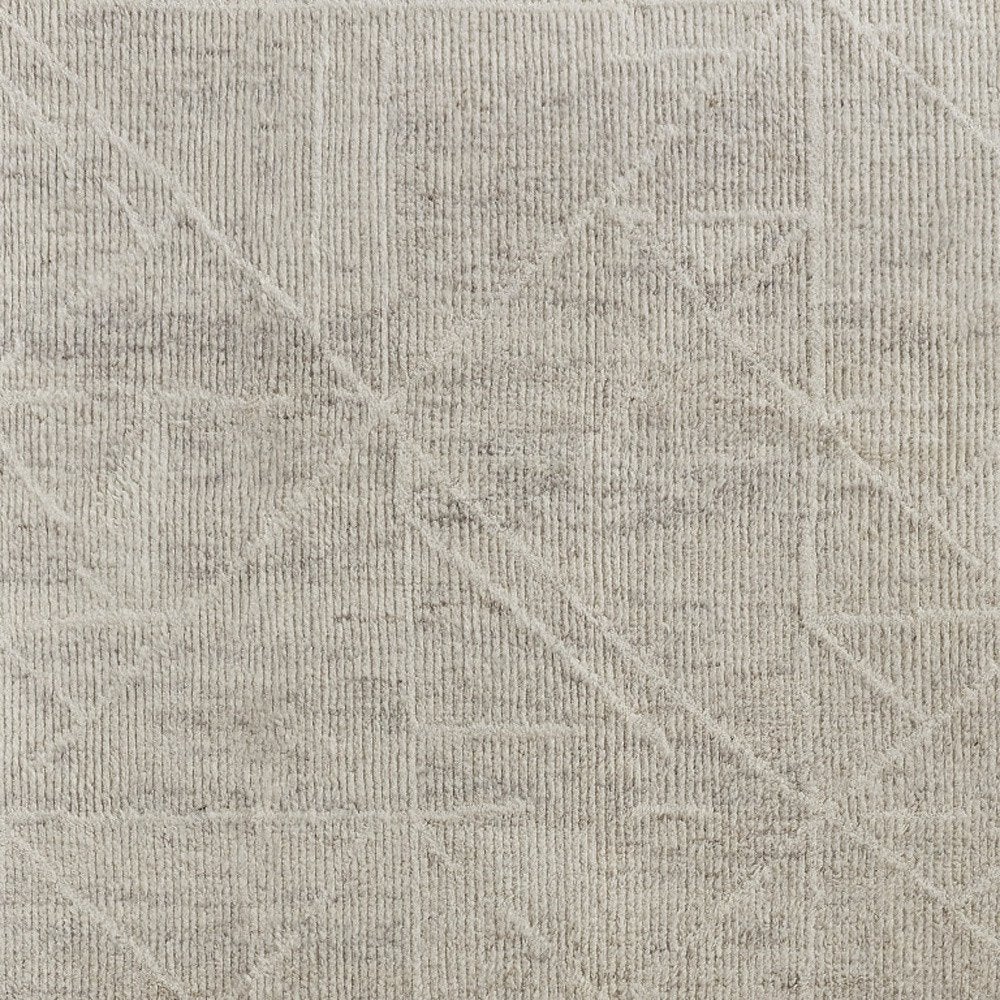 4' X 6' Tan and Ivory Wool Hand Knotted Area Rug