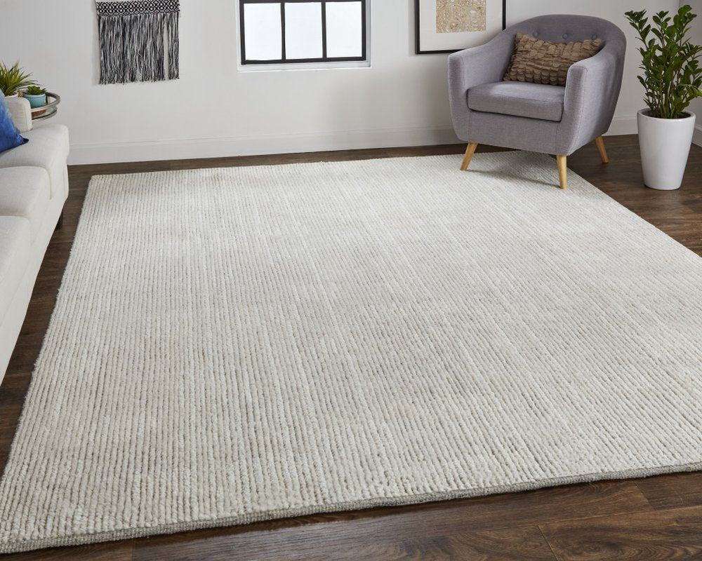 6' X 9' Tan and Ivory Wool Hand Knotted Area Rug
