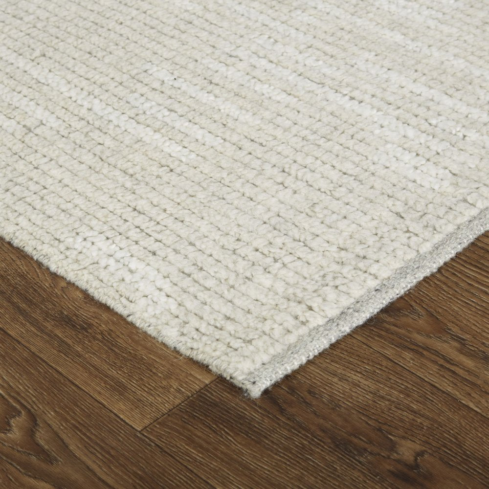 6' X 9' Tan and Ivory Wool Hand Knotted Area Rug