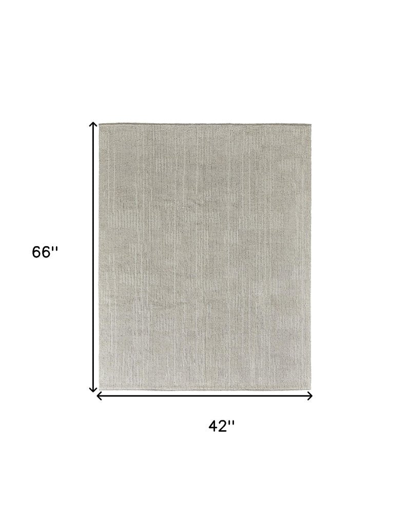 6' X 9' Tan and Ivory Wool Hand Knotted Area Rug