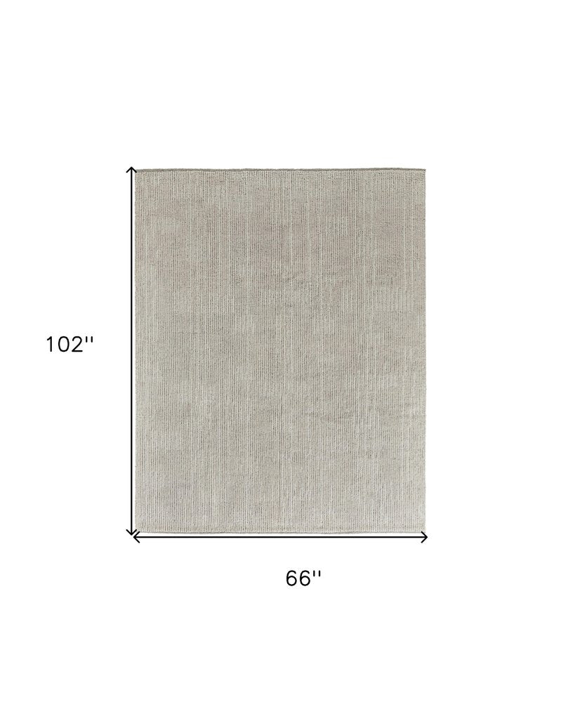 6' X 9' Tan and Ivory Wool Hand Knotted Area Rug