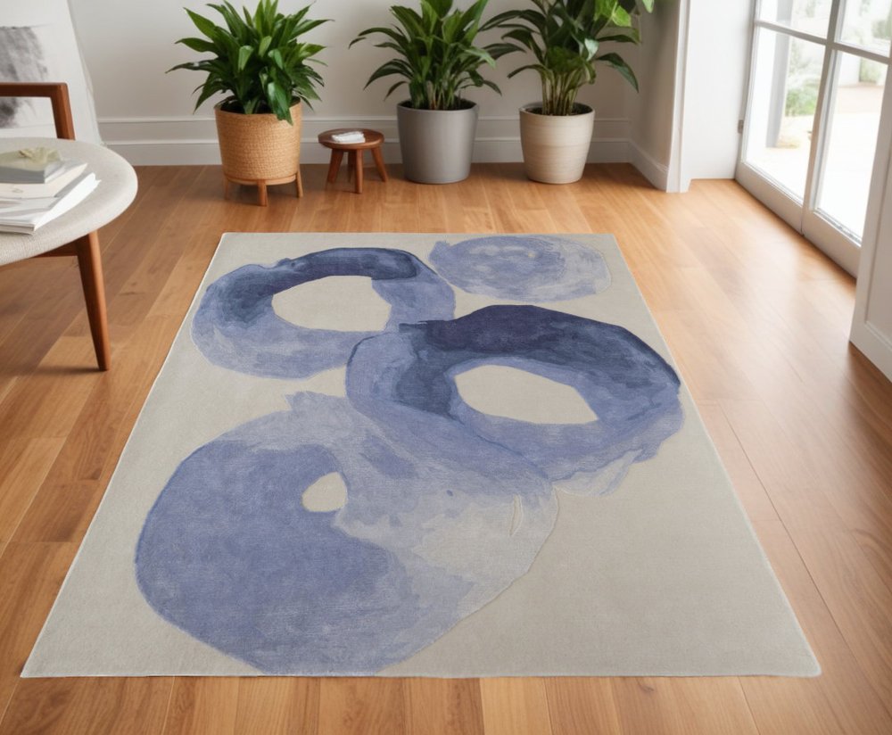 4' X 6' Blue and Ivory Abstract Hand Tufted Area Rug