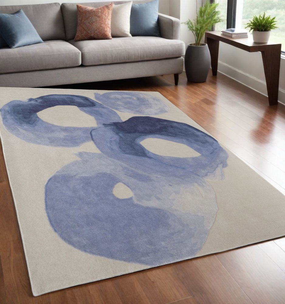 4' X 6' Blue and Ivory Abstract Hand Tufted Area Rug