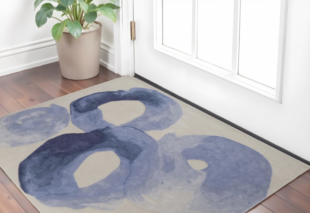 4' X 6' Blue and Ivory Abstract Hand Tufted Area Rug