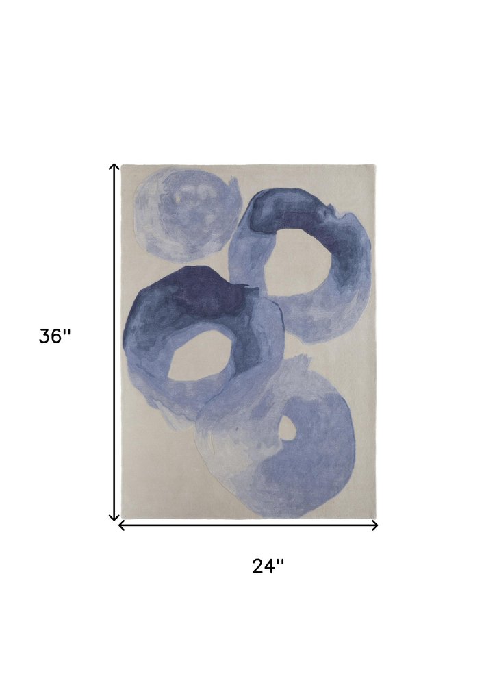 4' X 6' Blue and Ivory Abstract Hand Tufted Area Rug