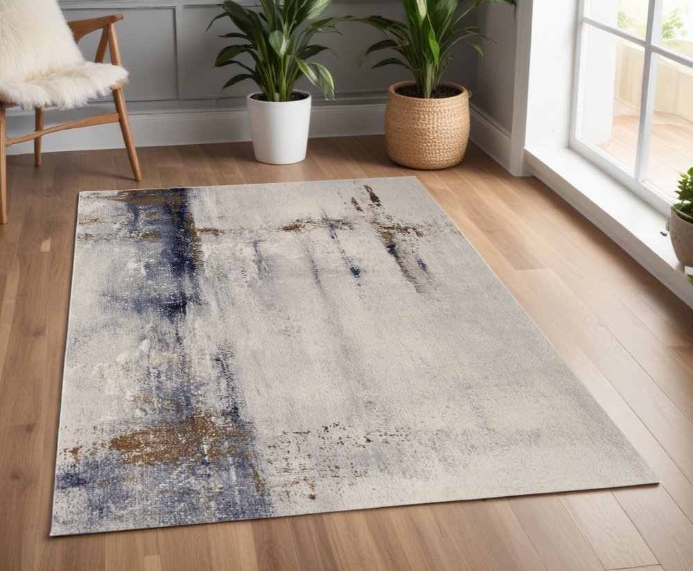 4' X 6' Ivory Blue and Brown Abstract Power Loom Area Rug