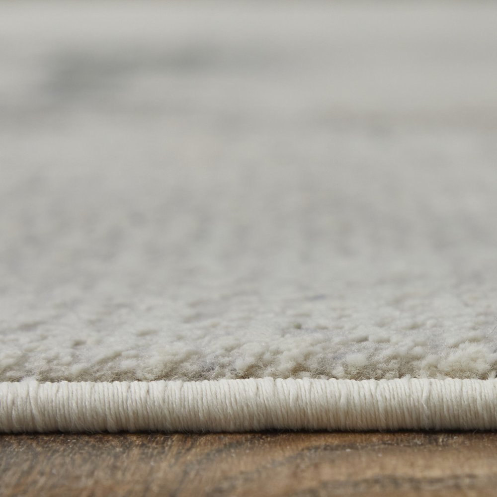 4' X 6' Ivory Blue and Brown Abstract Power Loom Area Rug