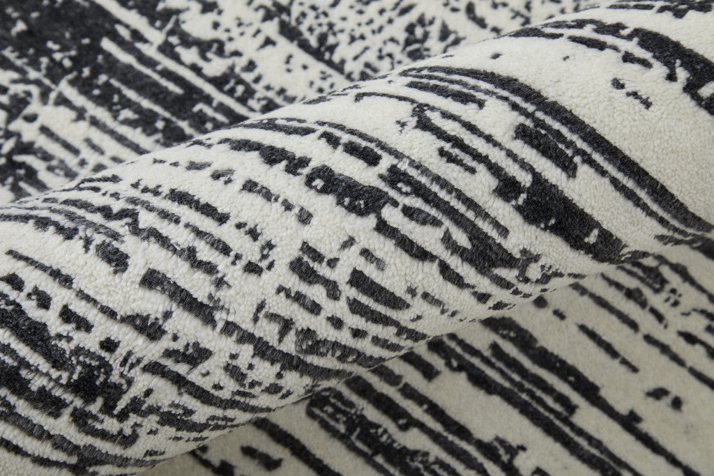 4' X 6' Black and Gray Abstract Hand Woven Area Rug