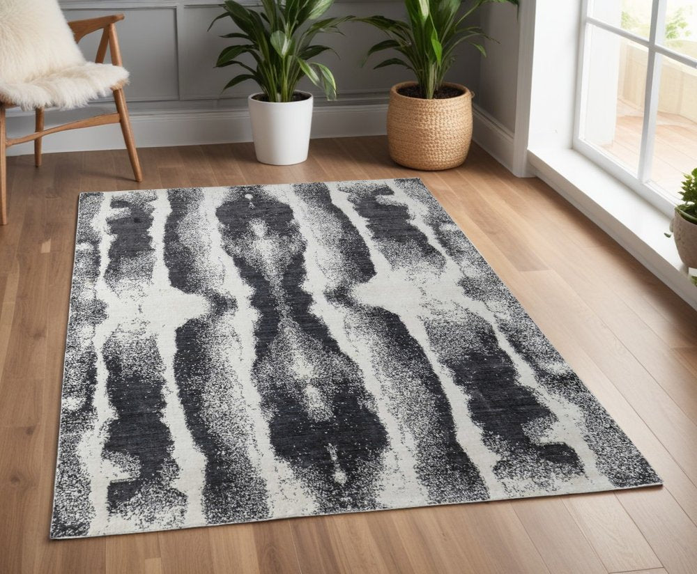4' X 6' Black and Gray Abstract Hand Woven Area Rug