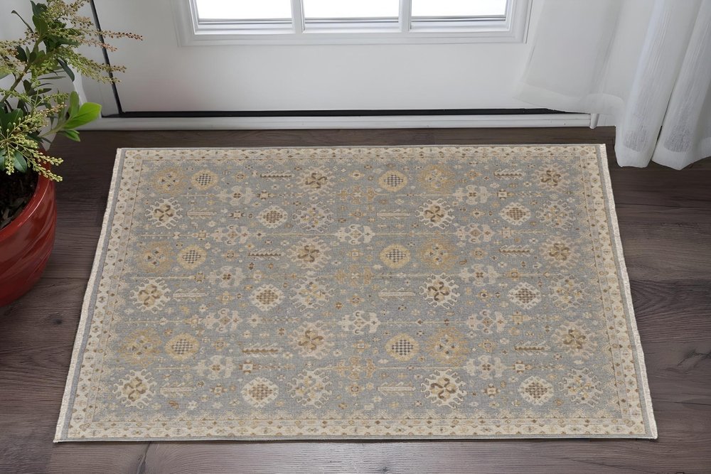 6' X 9' Gray and Ivory Wool Oriental Hand Knotted Area Rug With Fringe