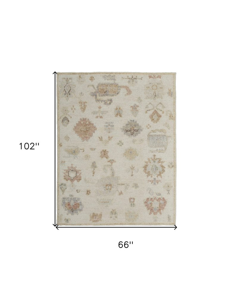 6' X 9' Ivory Tan and Gray Wool Floral Hand Knotted Area Rug