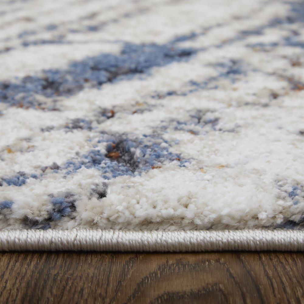 5' X 8' Ivory Blue and Brown Abstract Power Loom Area Rug