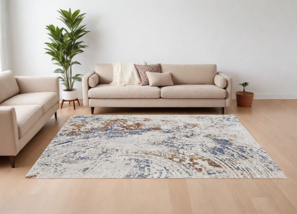 5' X 8' Ivory Blue and Brown Abstract Power Loom Area Rug