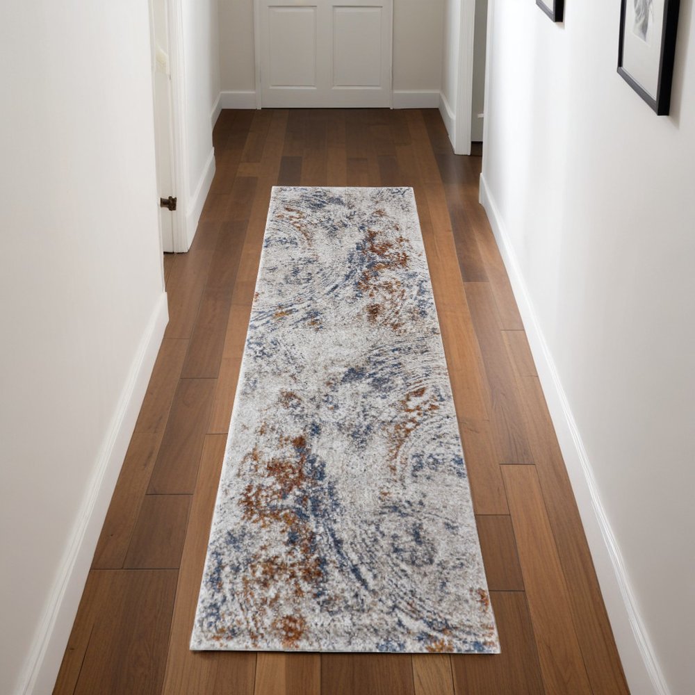 5' X 8' Ivory Blue and Brown Abstract Power Loom Area Rug
