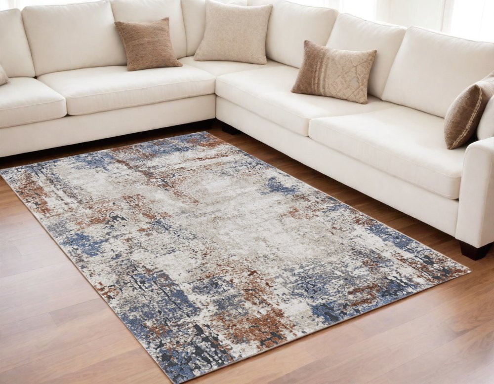5' X 8' Blue Gray and Brown Abstract Power Loom Worn Faded Area Rug