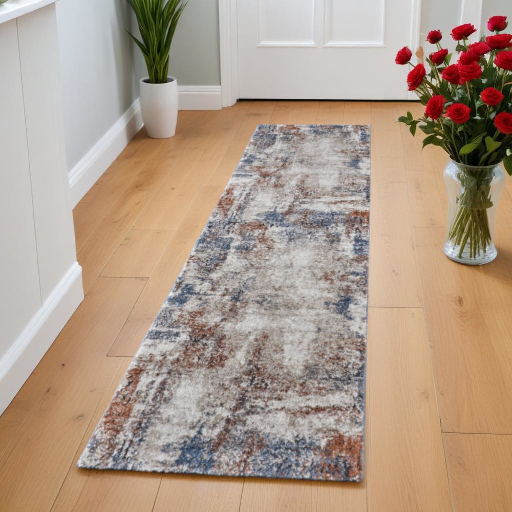 5' X 8' Blue Gray and Brown Abstract Power Loom Worn Faded Area Rug