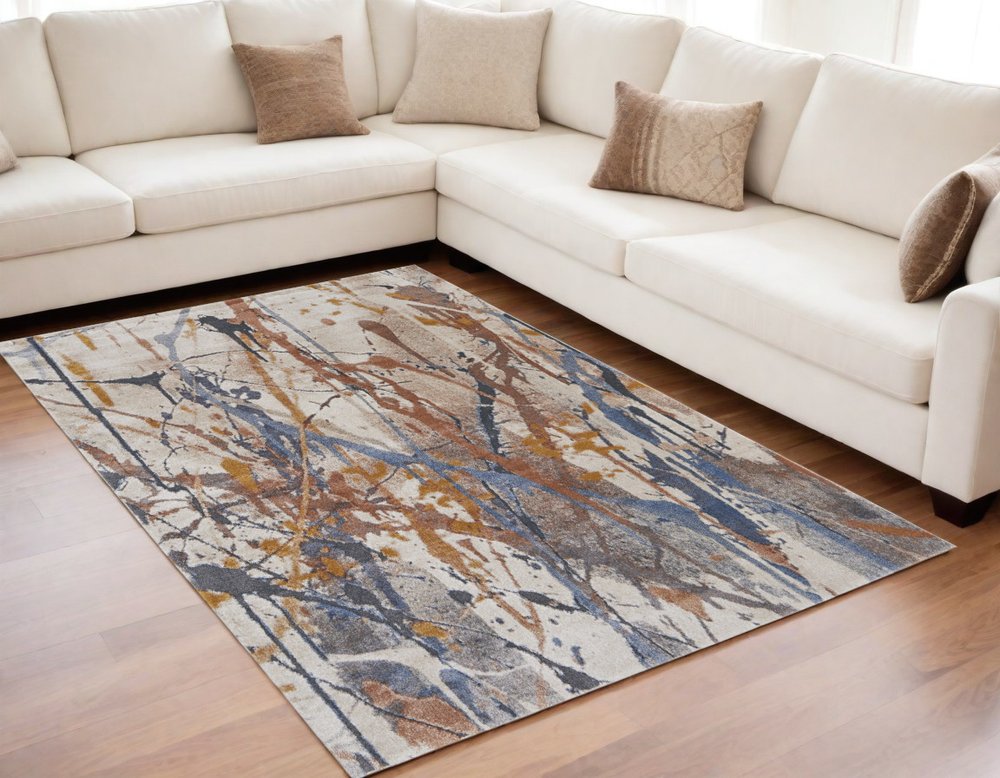 5' X 8' Ivory Blue and Brown Abstract Power Loom Area Rug