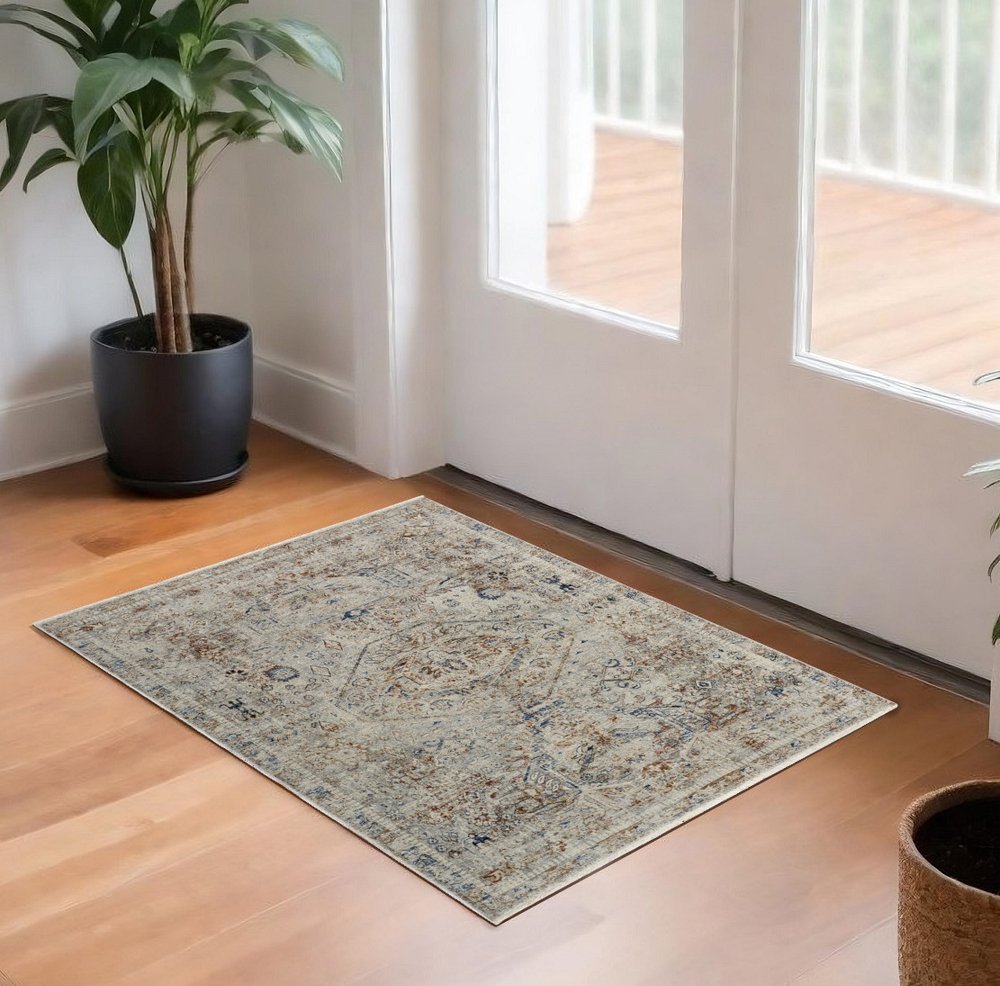 3' X 5' Blue Tan And Red Oriental Distressed Area Rug With Fringe