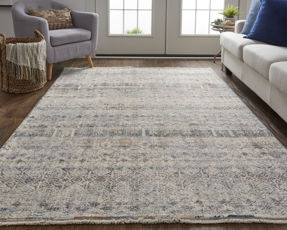 3' X 5' Gray Ivory and Blue Abstract Power Loom Worn Faded Area Rug With Fringe