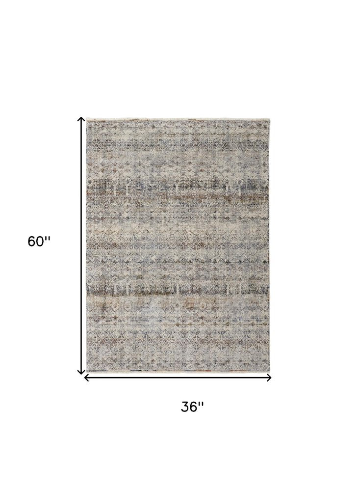 3' X 5' Gray Ivory and Blue Abstract Power Loom Worn Faded Area Rug With Fringe