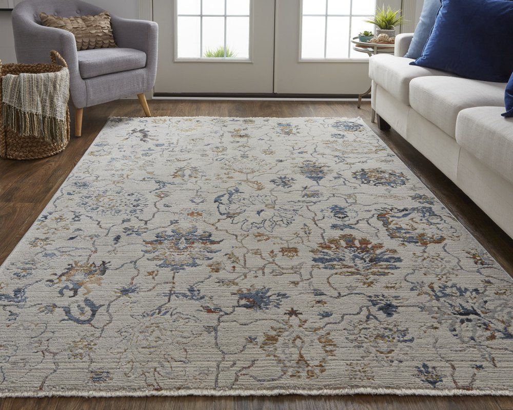 3' X 5' Ivory Blue And Burnt Orange Floral Distressed Area Rug With Fringe