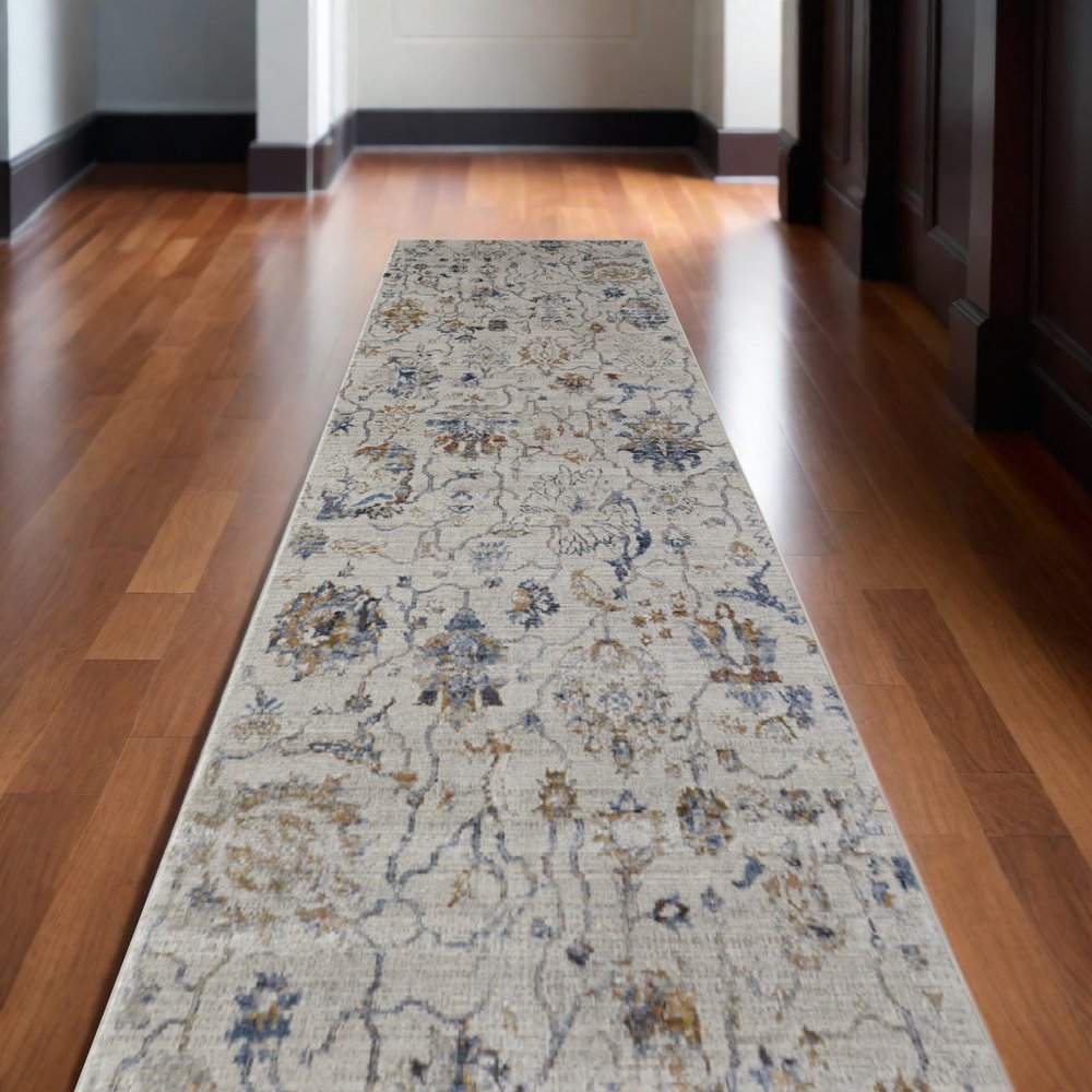 3' X 5' Ivory Blue And Burnt Orange Floral Distressed Area Rug With Fringe