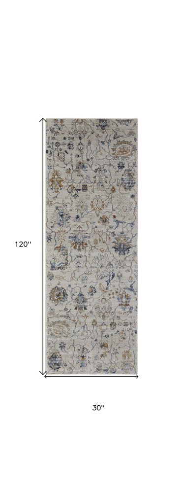 3' X 5' Ivory Blue And Burnt Orange Floral Distressed Area Rug With Fringe