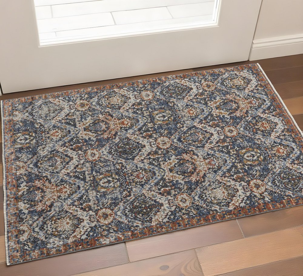 3' X 5' Ivory Blue And Burnt Orange Floral Area Rug With Fringe