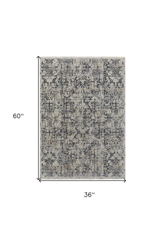 3' X 5' Ivory and Gray Abstract Power Loom Worn Faded Area Rug With Fringe