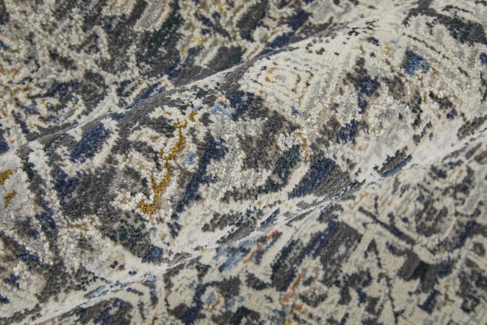 3' X 5' Ivory and Gray Abstract Power Loom Worn Faded Area Rug With Fringe