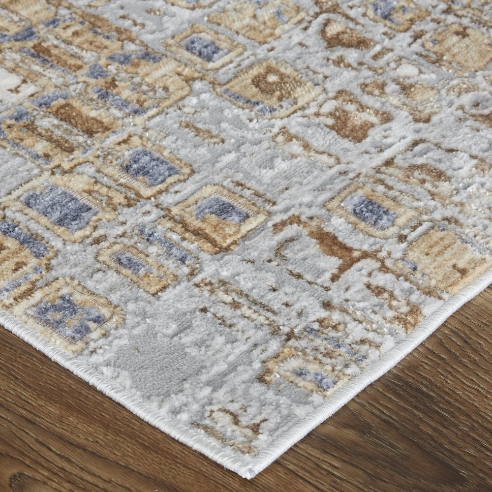 3' X 5' Tan Ivory and Blue Geometric Power Loom Worn Faded Area Rug