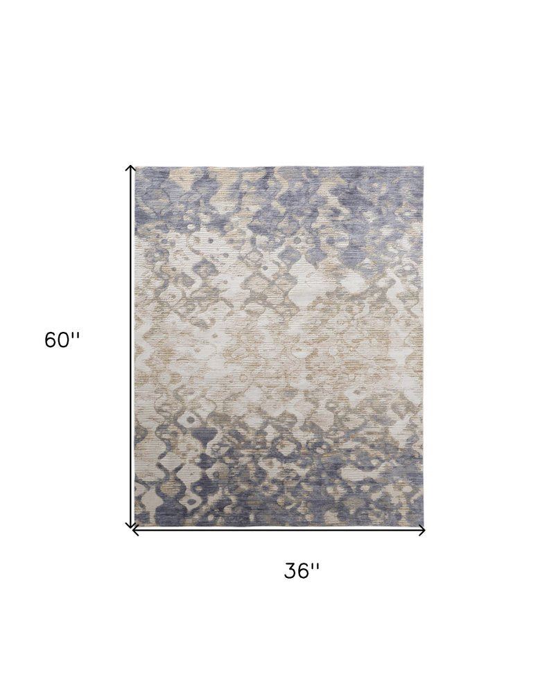 3' X 5' Ivory Tan And Blue Abstract Area Rug