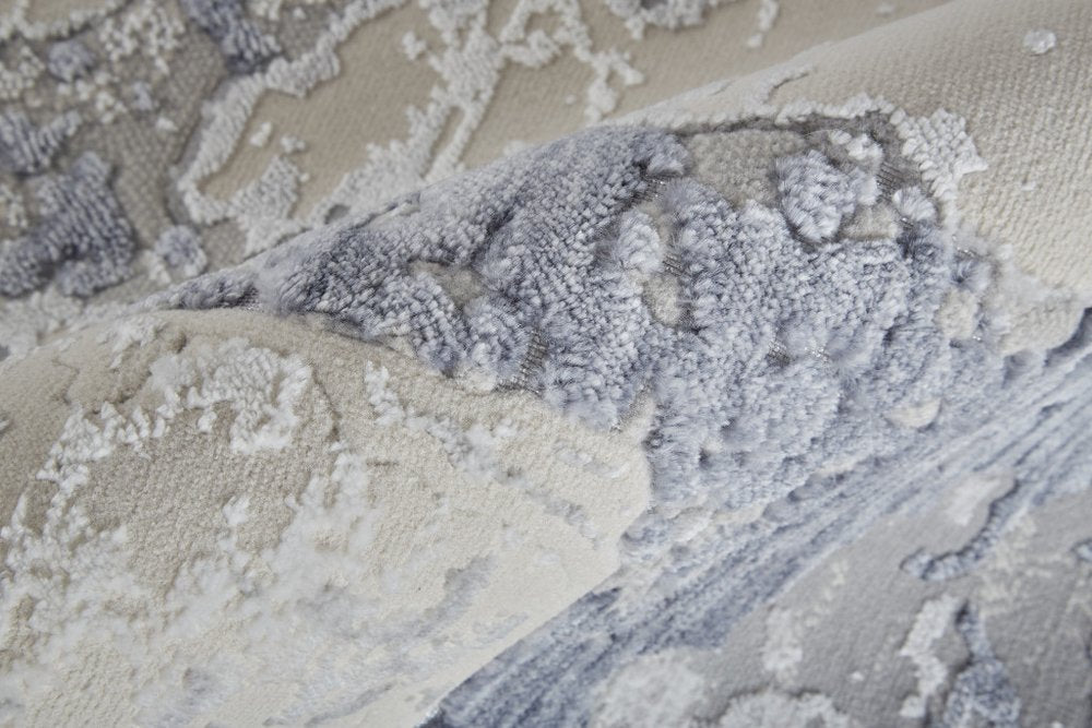 3' X 5' Ivory and Blue Abstract Power Loom Worn Faded Area Rug