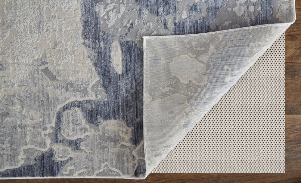 3' X 5' Ivory and Blue Abstract Power Loom Worn Faded Area Rug