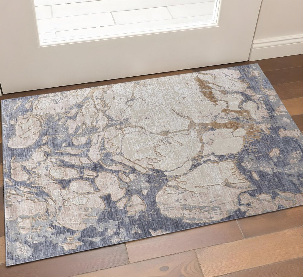 3' X 5' Ivory and Blue Abstract Power Loom Worn Faded Area Rug