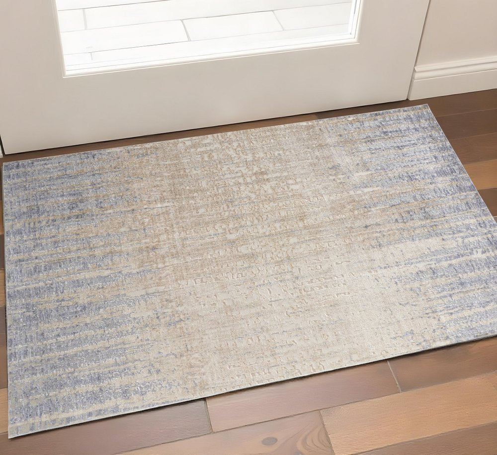 3' X 5' Tan And Blue Abstract Distressed Area Rug