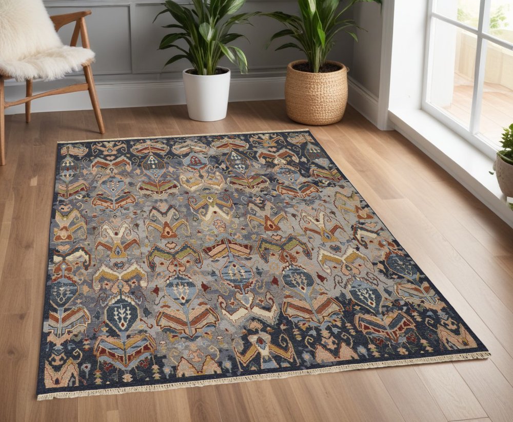 2' X 3' Ivory Blue and Brown Wool Ikat Hand Knotted Area Rug With Fringe