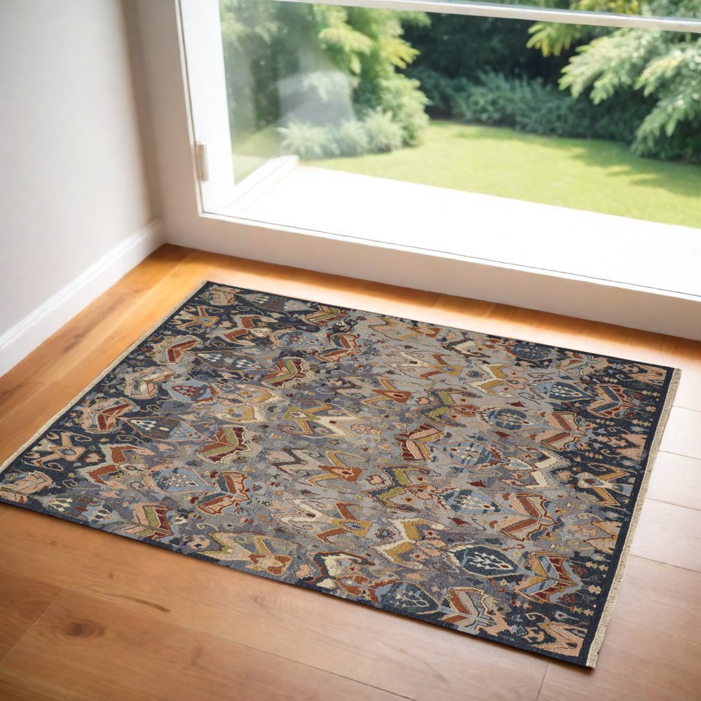 2' X 3' Ivory Blue and Brown Wool Ikat Hand Knotted Area Rug With Fringe